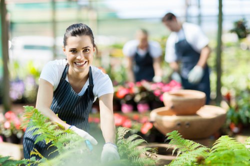 Professional gardeners working in a vibrant garden